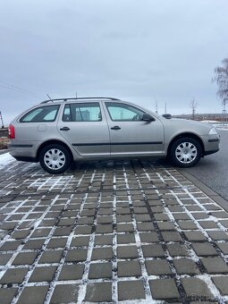 Škoda octavia 2 , 1.6 benzín 75 kw,2011 - 5