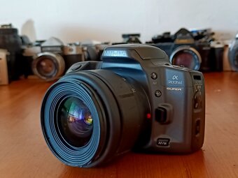 Staré fotoaparáty pro sběratele - Nikomat, Canon, Olympus.. - 5