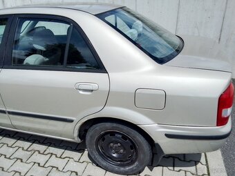 Mazda 323f-bj - 5