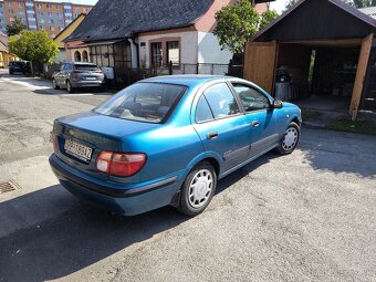 Nissan Almera 1,5 - 5