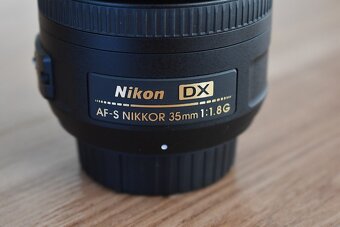 Nikkor 35 mm AF-s 1,8G nikon - clona krytky vrecko + filter - 5
