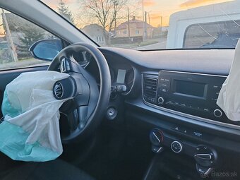 Kia rio - 5