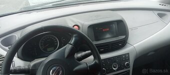 Nissan almera tino - 5