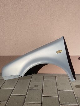 Predný blatnik VW Golf 4 LB7Z - 5