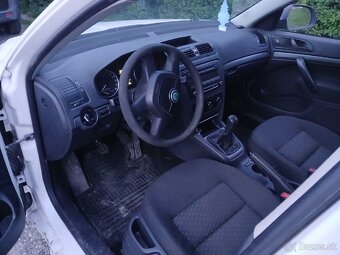 Škoda octavia 2 combi 1.6tdi facelift - 5