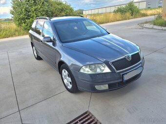 Predám Škoda Octavia 2 Combi 1.9 TDI 77kw DSG A/T r.v 2006 - 5