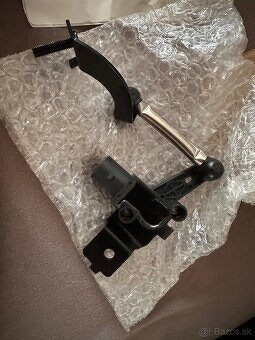 Snimac xenonu novy diel passat b7, skoda puklice, pas - 5