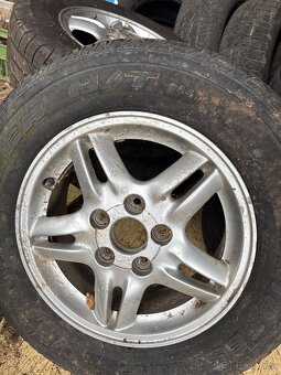 Hliníkové disky 5x114,3 r15 + nove gumy 205/70 - 5