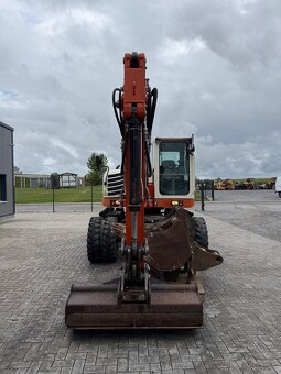 Kolový otočný bagr TEREX TW 110 - 5