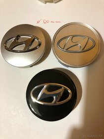 Stredové krytky (pukličky) Hyundai - priemer 57,60 mm sivé/č - 5