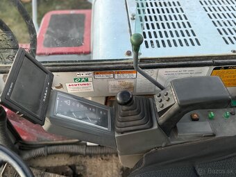 kolesovy bager Takeuchi TB70W - 5