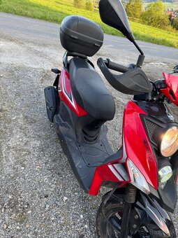 Sym CROX 125 - 5