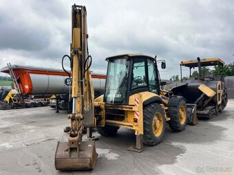 KOMATSU WB975 4X4 - 5