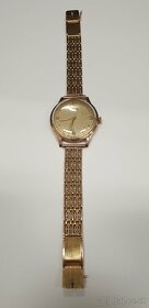 Zlaté náramkové hodinky zn. DOXA - 5