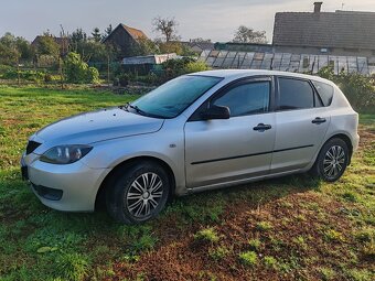 Mazda 3 1.4 benzín  62kw - 5