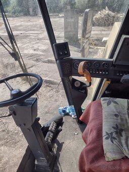 Predam kombajn New Holland TC56 - 5