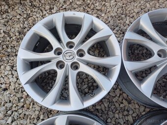 hlinikové disky org.Mazda 3,---7Jx17-ET-52,5---5x114,3 - 5