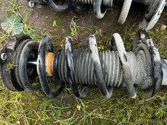 pružiny a tlmiče passat b7 - 5