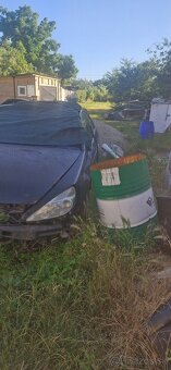 Peugeot 607 a Kia rio - 5