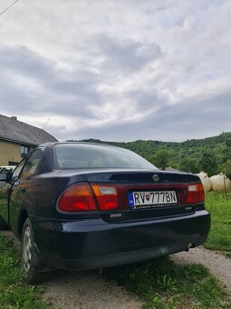 Mazda 323 1996 1.5 - 5