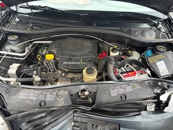 Rozpredam Daciu Sandero 1,4b 2010 - 5