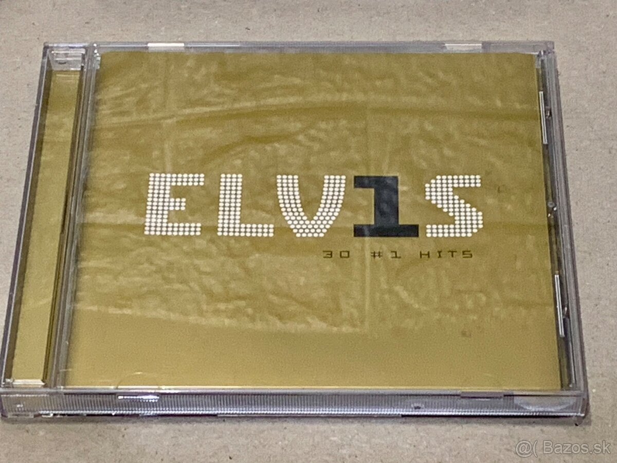 CD-čka; Eric Clapton. Madonna. U2. Elvis. CHER. The Rasmus. - 6