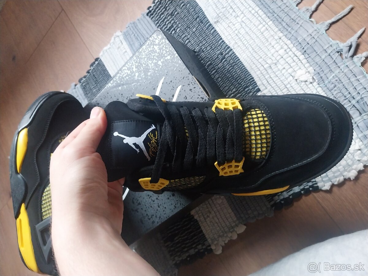 Jordan 4 Retro Thunder - 6