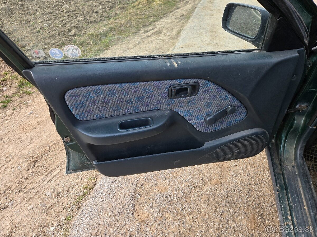 Nissan Almera 1.4 - 6