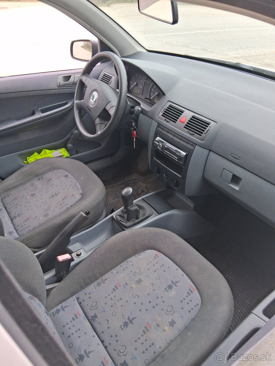 Škoda Fabia 1.2i 40kw - 6