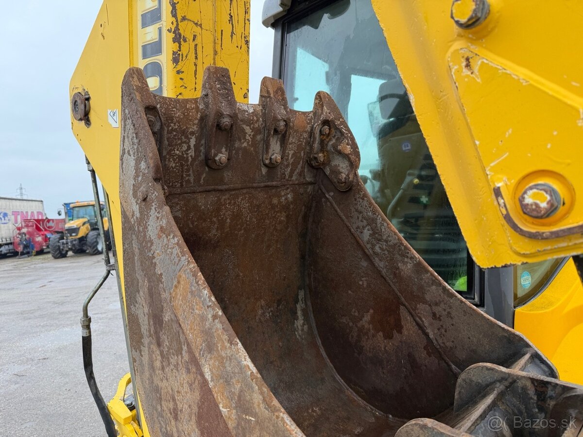 NEW HOLLAND traktor báger 2006 VIN 028 - 6