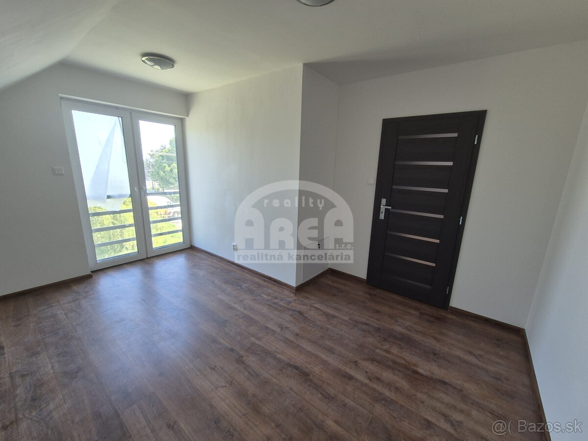 Novostavba dvojpodlažného rodinného domu v obci Kravany - 6