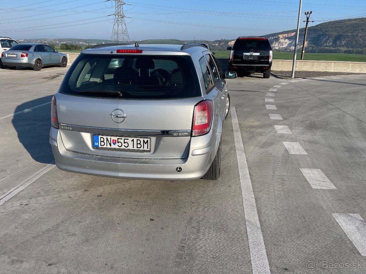 Opel astra H 1.9cdti - 6