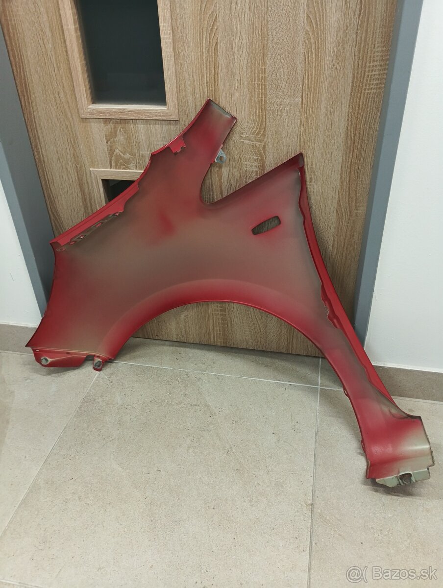 Pr. predný blatník Kia Rio - 6