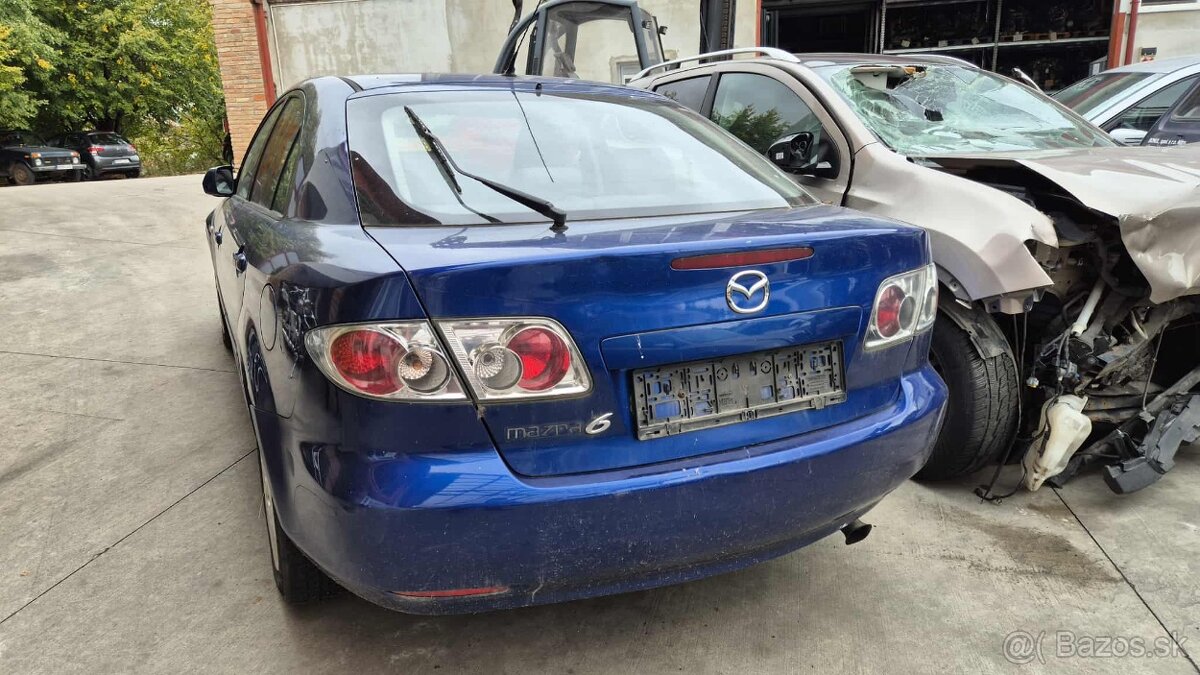 Mazda 6 2,0D 100kw kód motora: RF - 6