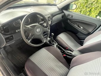 Nissan Almera  AA sedan- benzín 1,5 r. 2006 - 6
