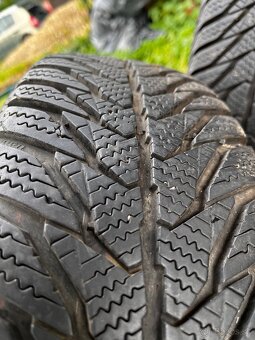 Oceľové disky R14 s puklicami a zimným pneu - 6