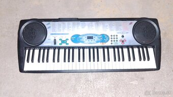 Predám klávesy Casio LK 40 - 6