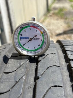 235/55R18 - 6