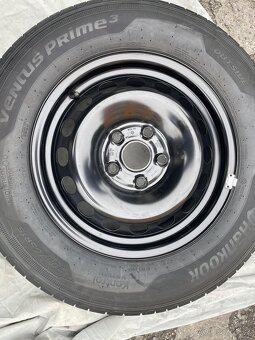 VW Caddy nova sada pneu s diskami 205/65R15 99H , 319 - 6