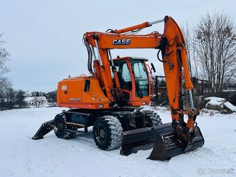 Kolesové rypadlo CASE WX145 - 6