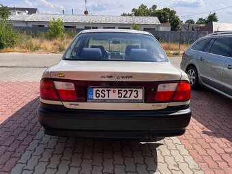 MAZDA 323 - 6