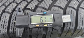 215-65-17 103V - Bridgestone- 4324- 6,7mm - top stav - 6
