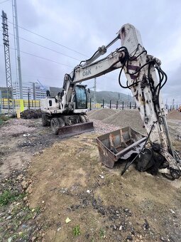 Kolesový bager O&K MH 5.5 - 6