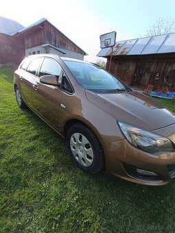 Opel Astra st j - 6