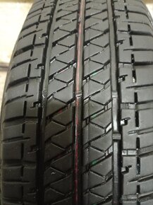 Predám pneu.zanovne s disky land Rover freelander 195/80r15 - 6