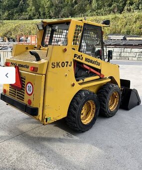 Šmykovy nakladač komatsu sk07j - 6