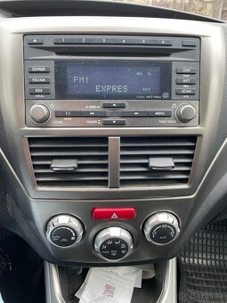Subaru Impreza 1.5 Comfort 4x4 - 6