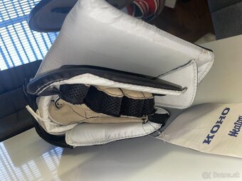 Vyrážačka  hokejová CCM Intermedial - M - 6