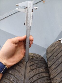 235/60R18 - 6