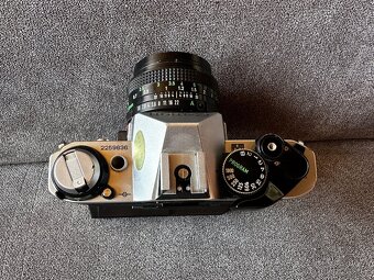 Canon EA-1 PROGRAM - Canon Lens FD 50mm 1:1,8 - Canon power - 6